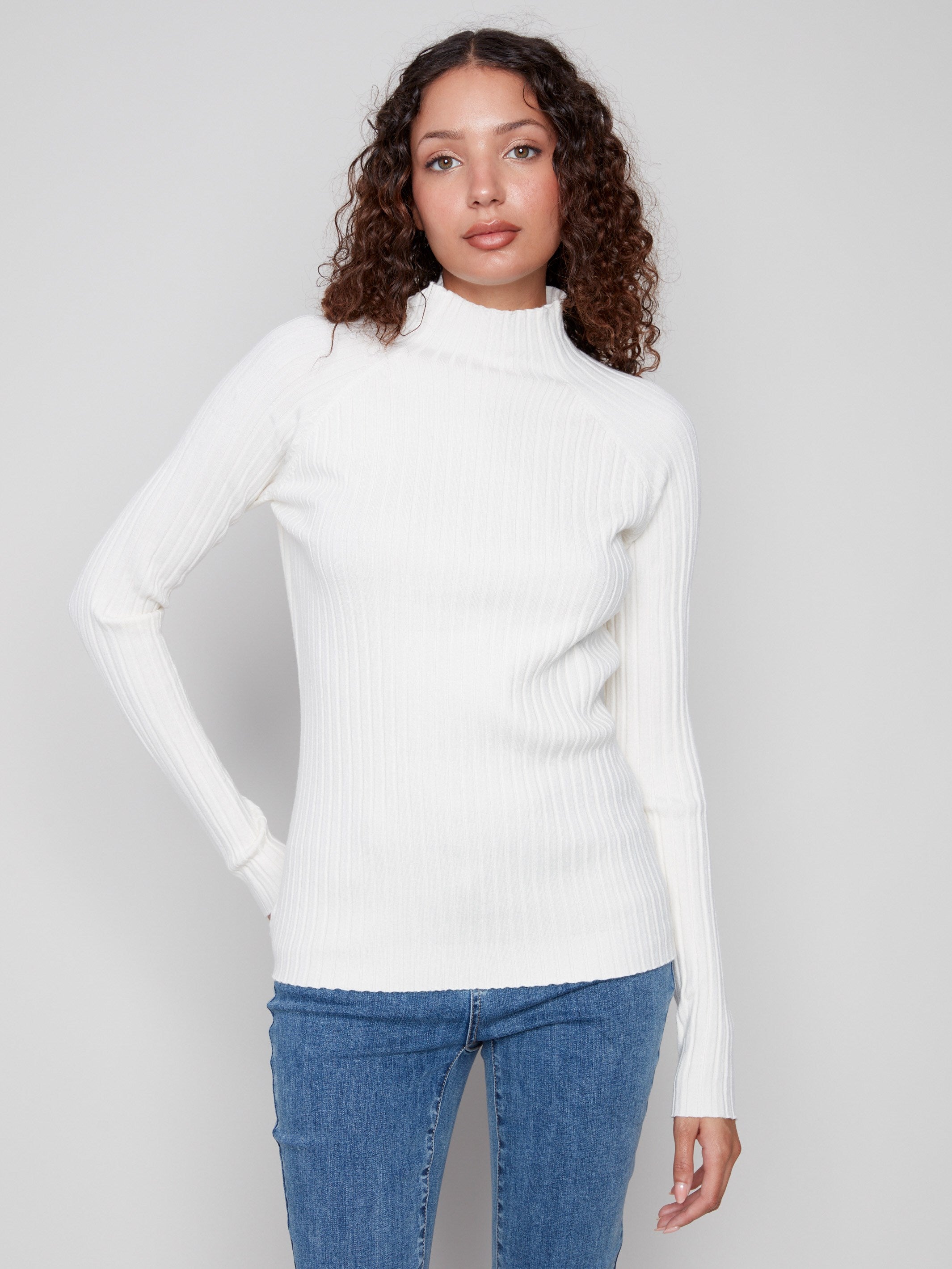 Ecru slim fit sweater featuring a ribbed knit design for a sleek silhouette by Charlie B.