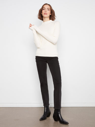 Crafted with a ribbed knit texture, this sweater offers both style and comfort by Charlie B.