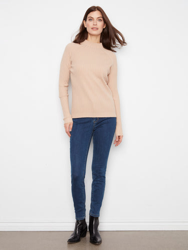 Experience the slim fit elegance of this sweater, crafted to enhance your silhouette with style and comfort. By Charlie B.