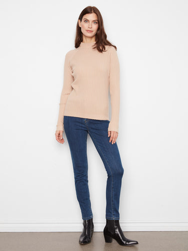 Long sleeves offer added coverage and warmth while maintaining a sleek silhouette in any setting. By Charlie B.