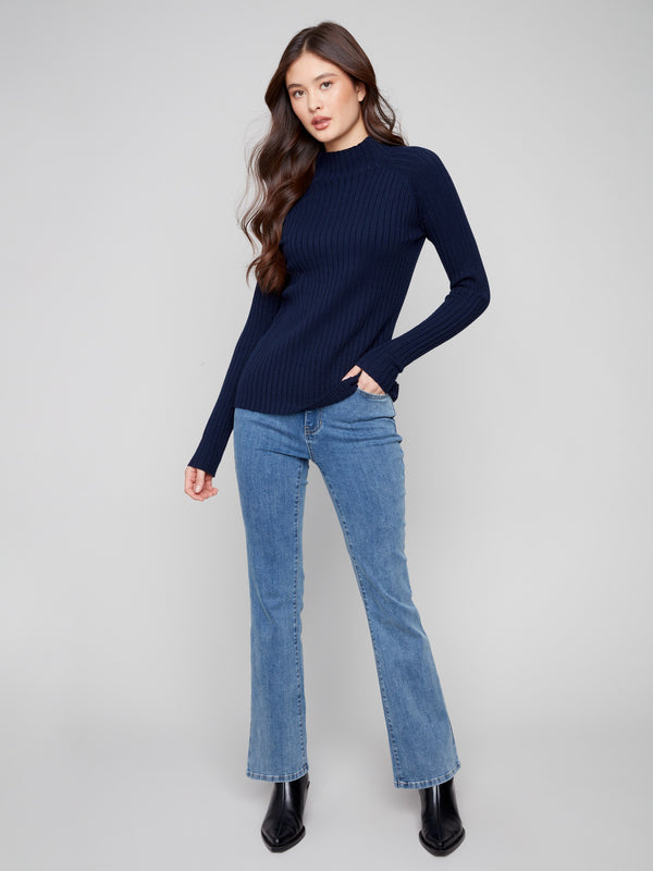 Elegant navy sweater featuring a slim fit design, crafted with attention to detail by Charlie B.
