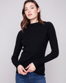 Black ribbed knit sweater featuring a stylish mock neck design by Charlie B.