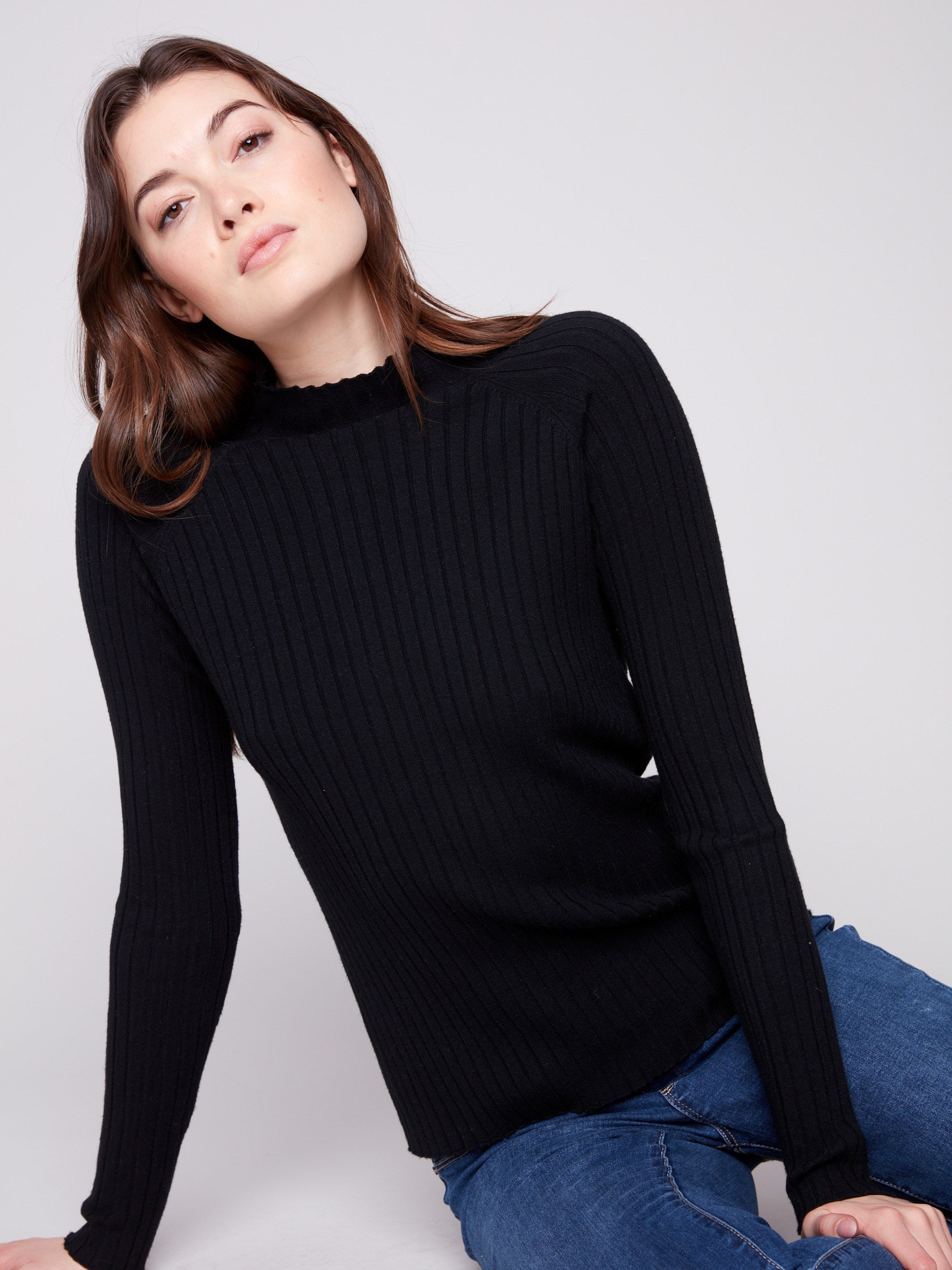 Elegant black sweater with a slim fit and ribbed texture by Charlie B.