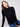 Elegant black sweater with a slim fit and ribbed texture by Charlie B.