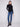 Chic black knit sweater highlighting long sleeves and modern style by Charlie B.