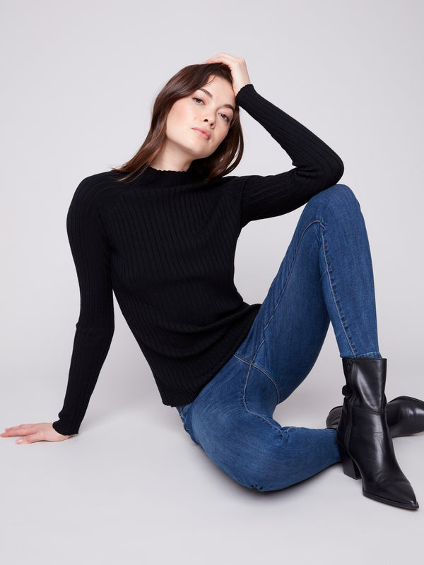 Sophisticated black mock neck sweater with a sleek, slim fit by Charlie B.