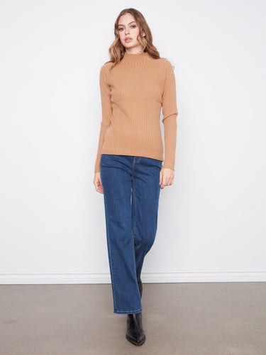 Long sleeve sweater featuring a textured ribbed knit that adds depth and interest to your look. Style it effortlessly with Charlie B.