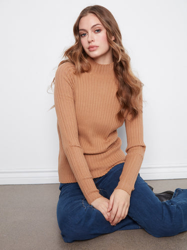 Mock neck detail elevates this classic piece, offering both warmth and sophistication for any occasion by Charlie B.