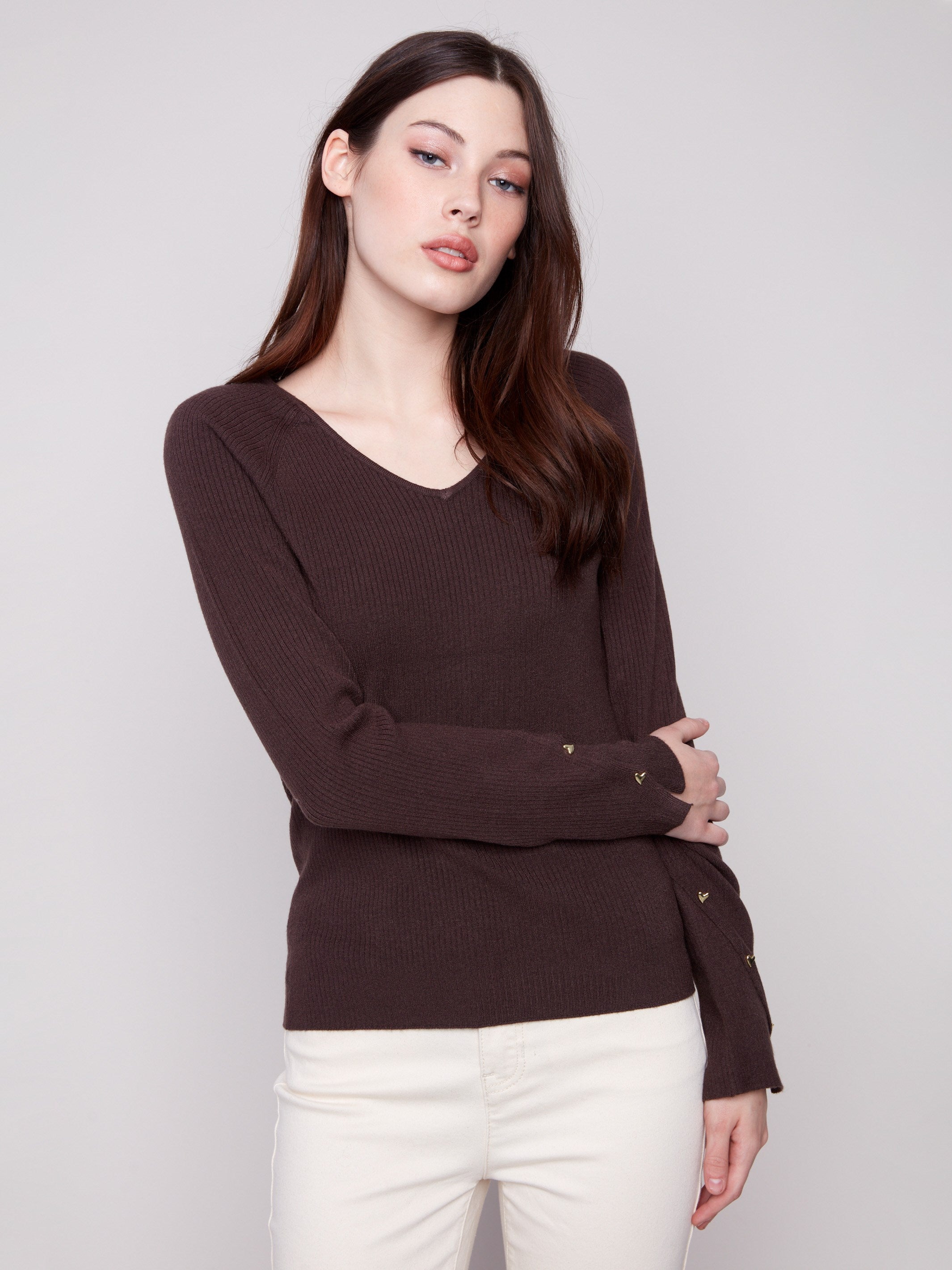 Mocha sweater featuring a slim fit design, enhanced by ribbed texture and heart rivets on sleeves by Charlie B.