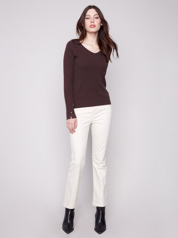 Chic mocha V-neck sweater with slit cuffs, adorned with heart rivets for a unique touch by Charlie B.