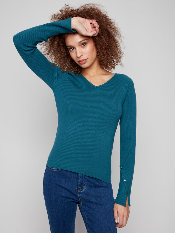 Elegant ribbed texture adds a touch of sophistication to this versatile V-neck sweater by Charlie B.