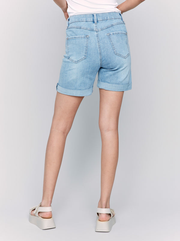 Stretchy light blue denim shorts showcasing a timeless five-pocket style by Charlie B.