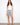 Model showcasing blue striped denim shorts with a five-pocket design, ideal for everyday wear by Charlie B.