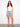 Model showcasing blue striped denim shorts with a five-pocket design, ideal for everyday wear by Charlie B.