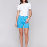 Lagoon blue shorts featuring a regular rise and stretch twill fabric by Charlie B.