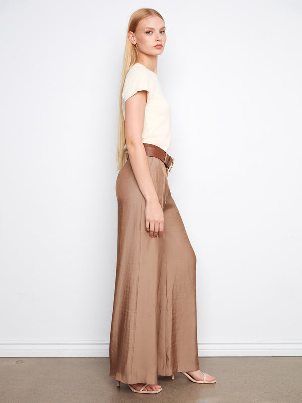 Featuring slash pockets, these pants combine practicality with style effortlessly by Charlie B.