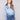 Blue satin shirt with long sleeves and a soft, luxurious fabric, featuring a twisted front detail by Charlie B.
