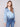 Blue satin shirt with long sleeves and a soft, luxurious fabric, featuring a twisted front detail by Charlie B.
