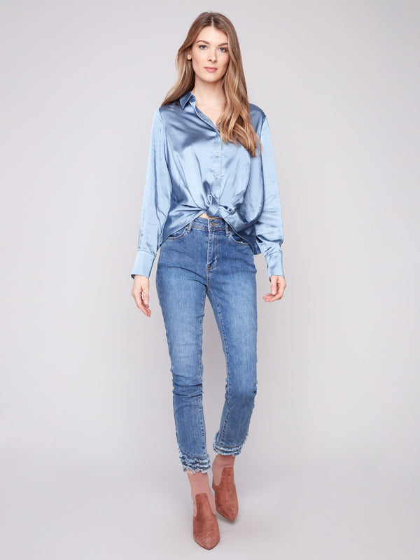 Elegant blue button-down shirt made from soft satin with a classic shirt collar for added sophistication by Charlie B.