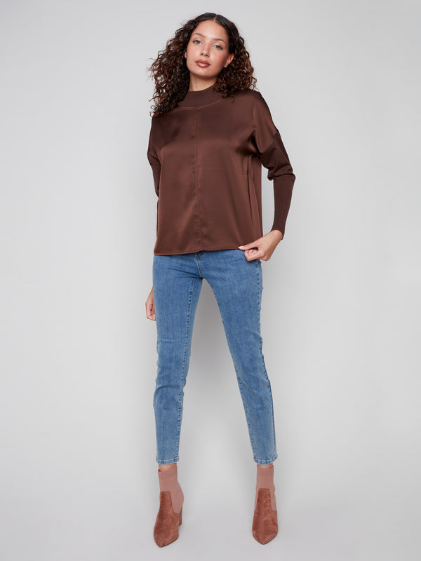 Mocha satin knit top showcasing drop shoulders for a relaxed fit and modern look by Charlie B.