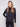 Elegant black satin-knit top with a chic mock neck and drop shoulders, perfect for any occasion by Charlie B.