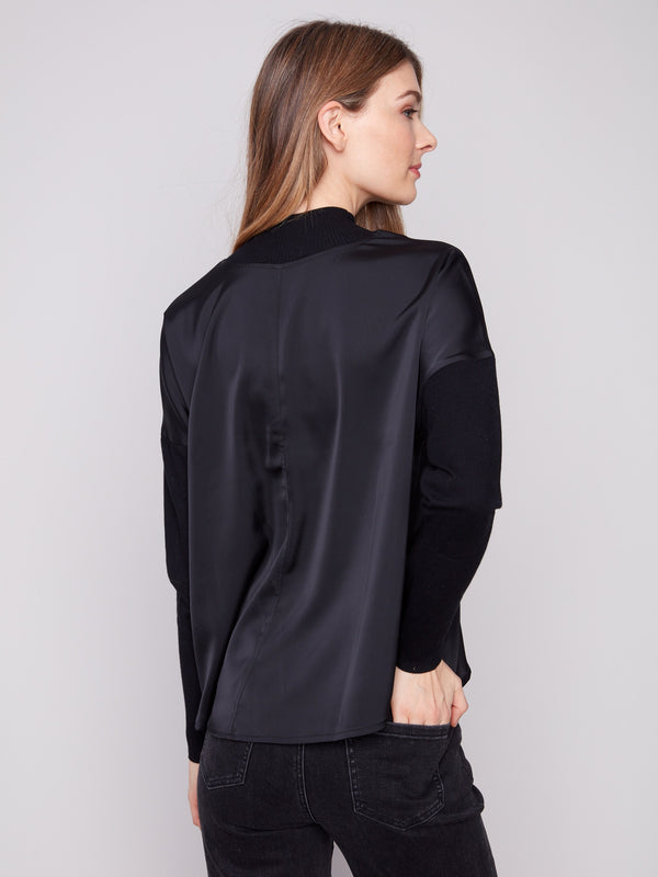 Fashion-forward satin knit with ribbed cuffs and neckline, offering both comfort and style by Charlie B.