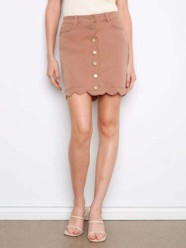 Stylish short length skirt featuring convenient front buttons for easy wear. By Charlie B.