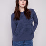 Moonlight Scuba Knit Top showcasing its elegant crew neckline, paired with long sleeves for a stylish look by Charlie B.