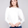 Elegant Ecru Scuba Knit Top with intricate soutache front detail, featuring a stylish crew neckline by Charlie B.