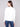 Sophisticated Ecru Scuba Knit Top featuring unique soutache front detail for a modern look by Charlie B.