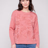Primrose Scuba Knit Top with a classic crew neckline, perfect for casual elegance, featuring intricate design by Charlie B.