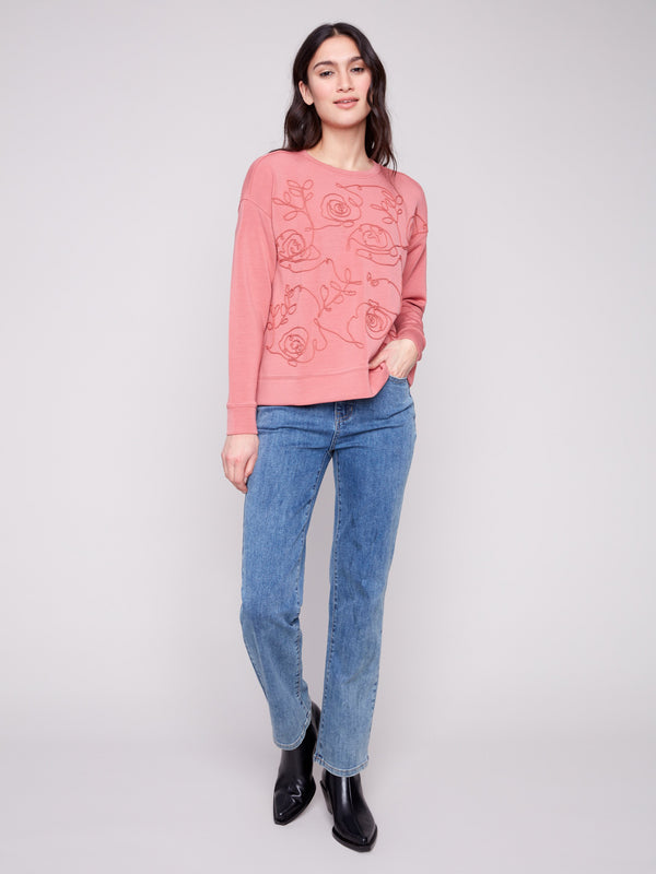 Experience the charm of long sleeves in this Primrose Scuba Knit Top, designed for comfort and style by Charlie B.