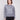 Heather grey sweater featuring a drop shoulder design with sparkling sequins by Charlie B.