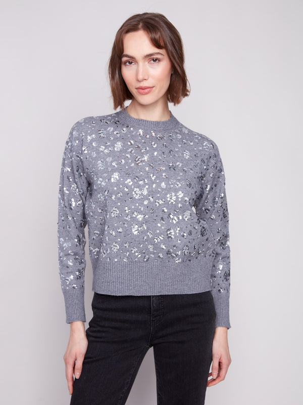 Heather grey sweater featuring a drop shoulder design with sparkling sequins by Charlie B.