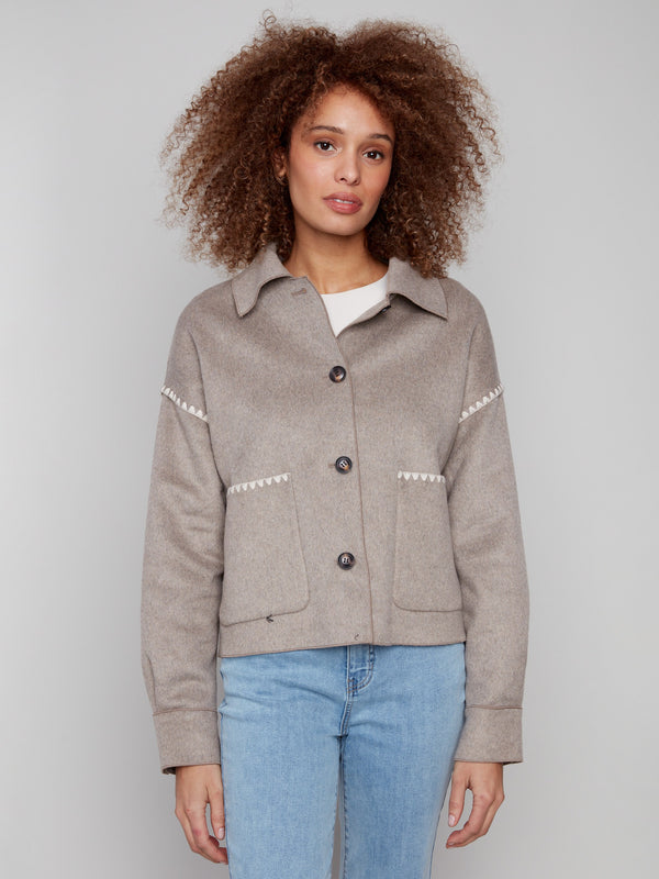 Stylish wool jacket in heather oatmeal showcasing practical patch pockets, perfect for everyday wear by Charlie B.