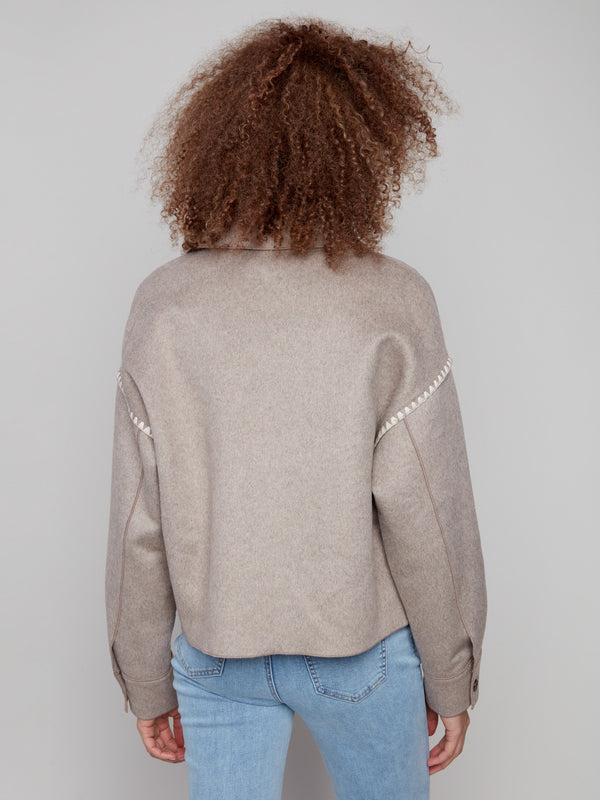 Heather oatmeal wool jacket with button cuffs that offer both style and functionality for any occasion by Charlie B.