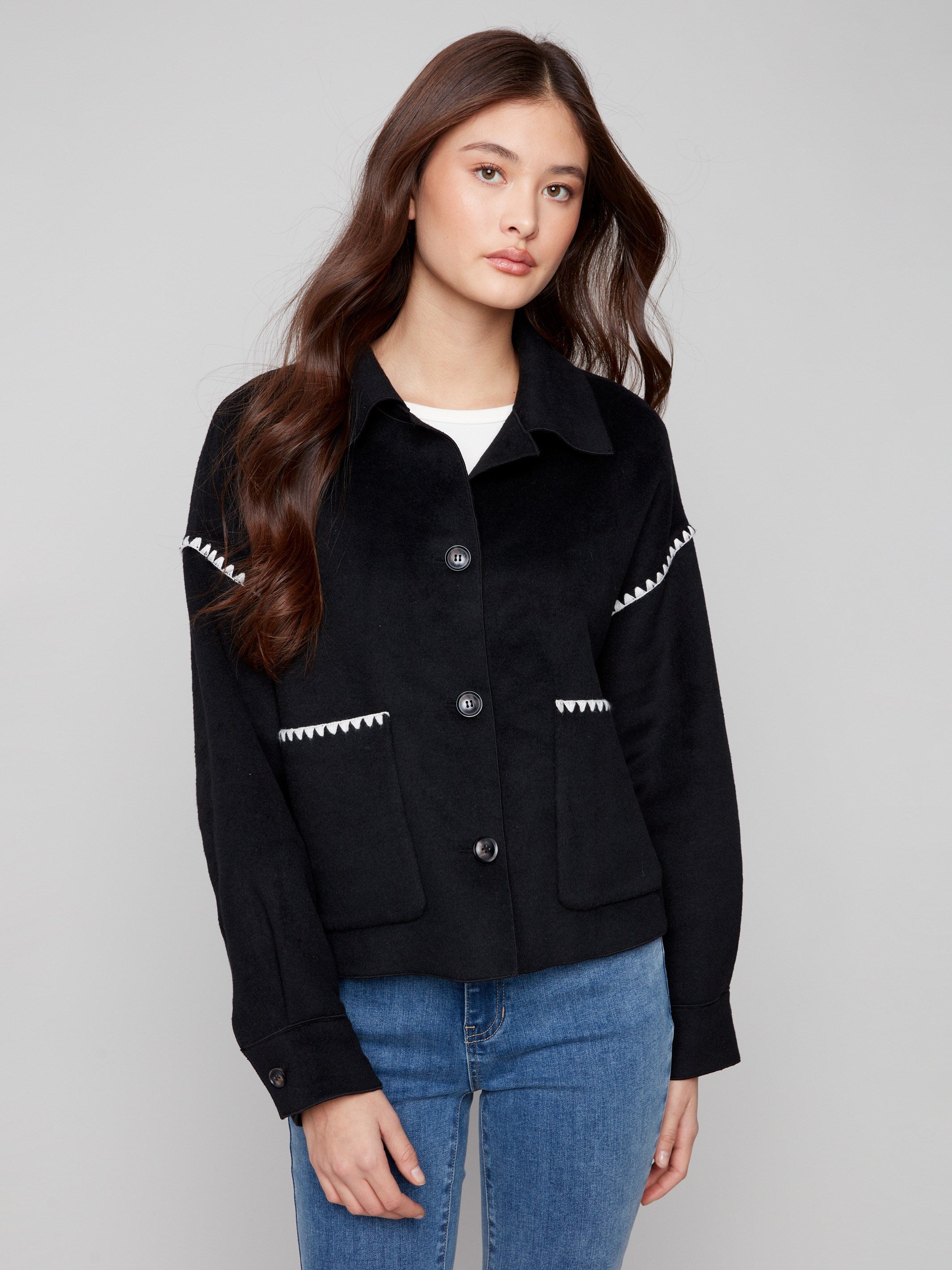 Black wool jacket featuring a classic shirt collar and stylish button cuffs, perfect for any occasion by Charlie B.