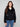 Chic black double-face wool jacket showcasing sophisticated design elements like button cuffs by Charlie B.