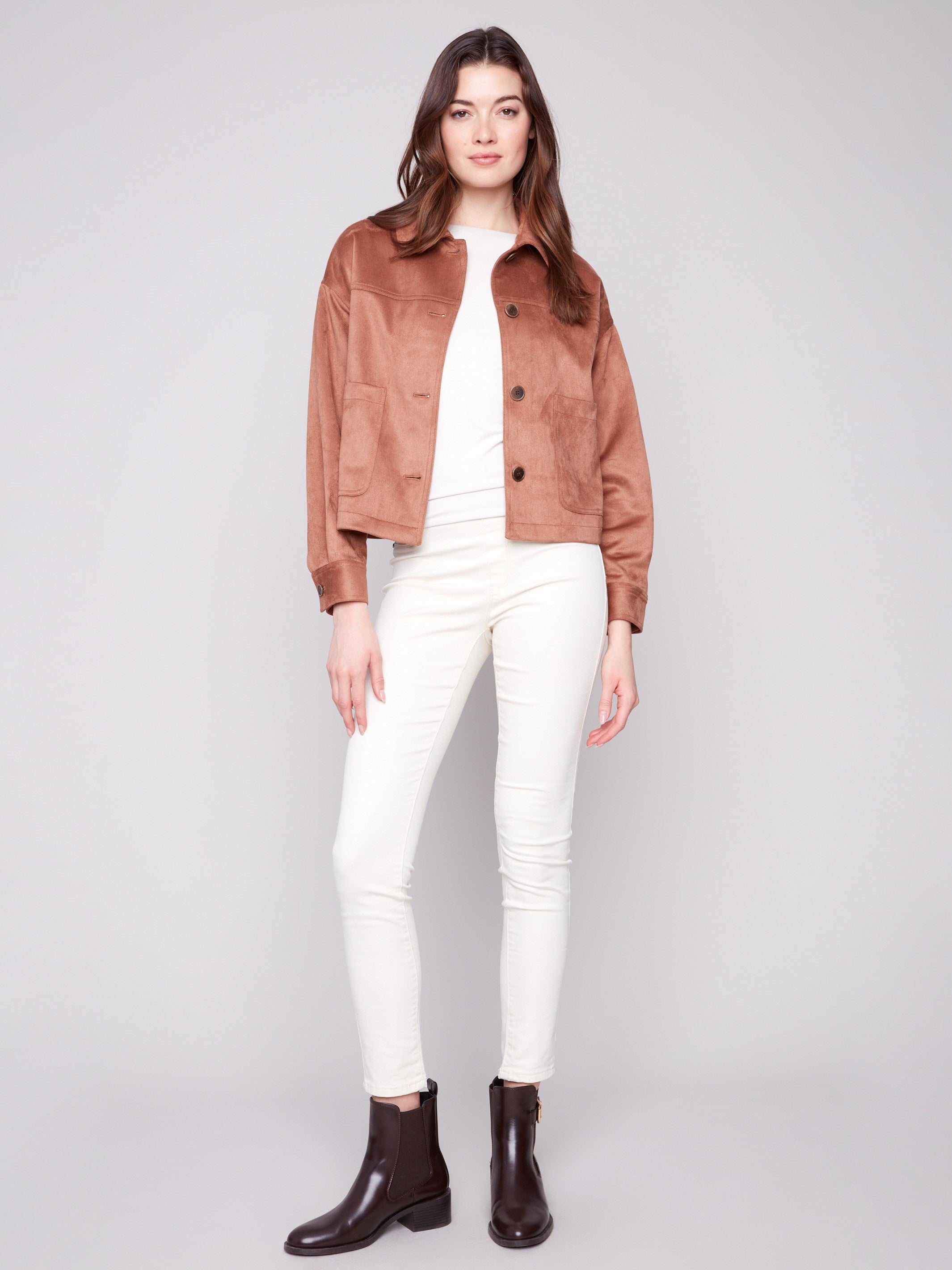 Stylish faux suede jacket featuring button cuffs to add a refined touch by Charlie B.