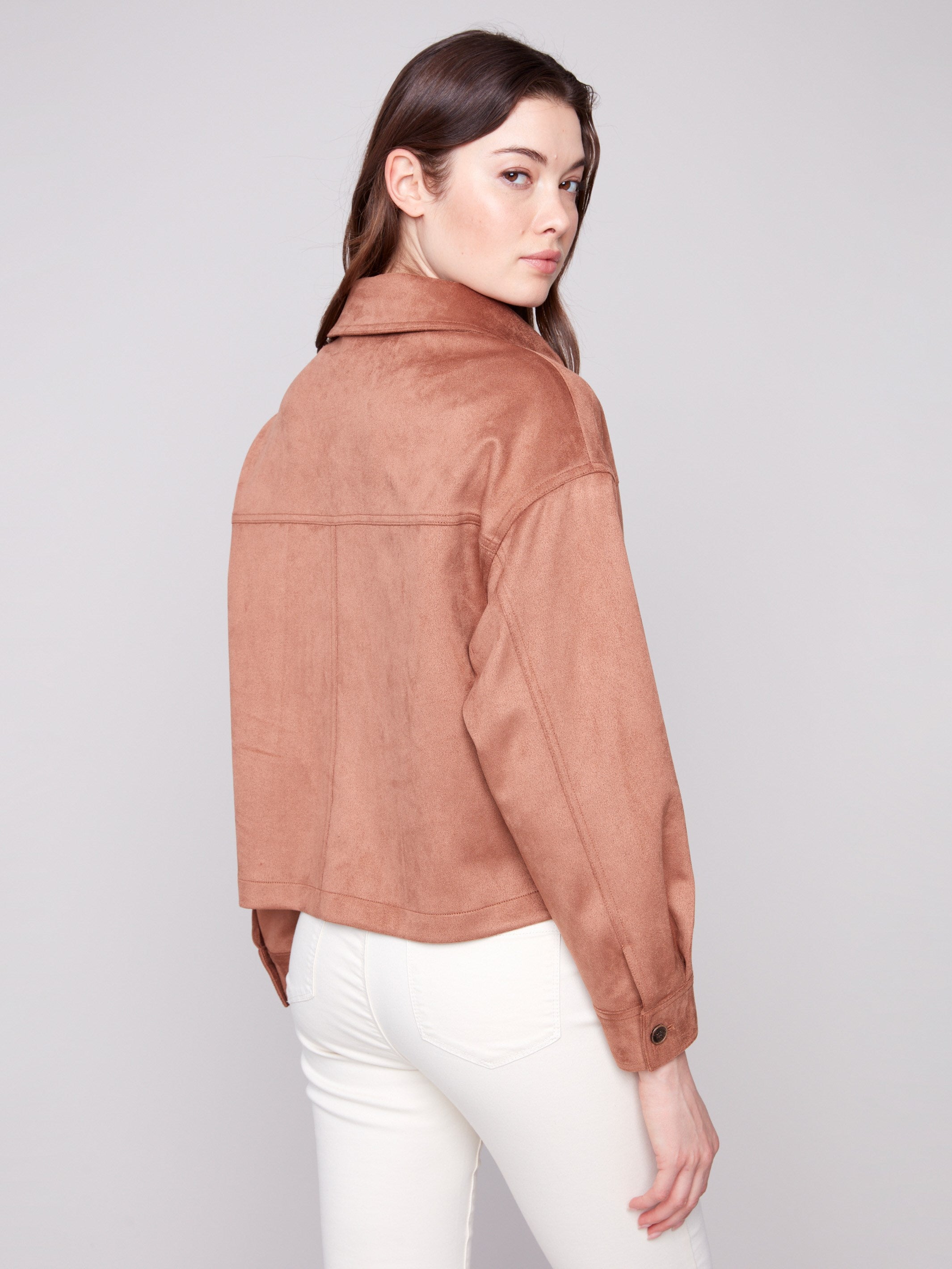 Chic faux suede piece showcasing a sleek button front closure for easy wear by Charlie B.