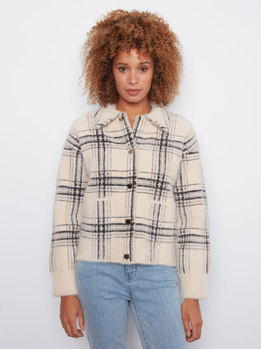 Elegant plaid design with convenient patch pockets, ideal for carrying small essentials while on the go by Charlie B.