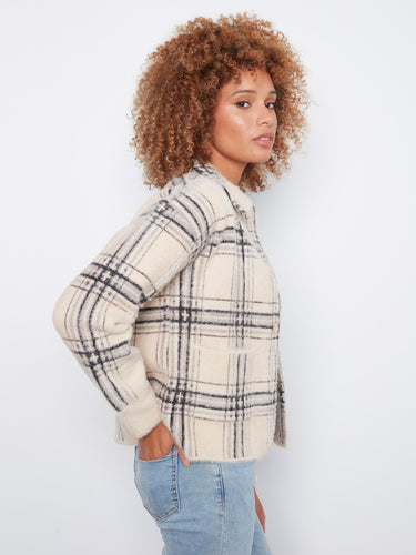 Warm and chic plaid outerwear designed to keep you cozy during cooler days while maintaining effortless style by Charlie B.