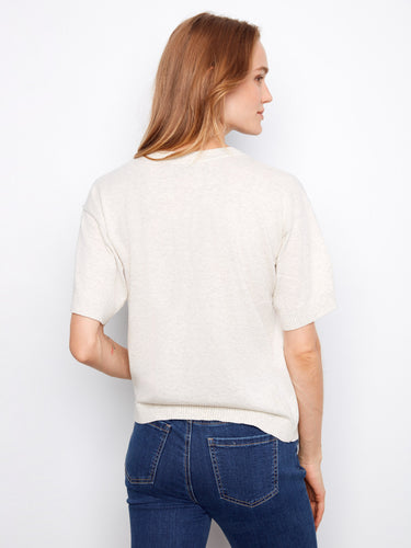 Crafted from soft 100% cotton, this top features a crew neckline and relaxed fit for everyday wear by Charlie B.