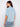 Stylish light blue blouse with comfortable short sleeves and elegant chest pockets by Charlie B.