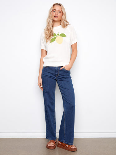 Versatile and comfortable, this cotton sweater pairs well with jeans, showcasing its crew neck charm. By Charlie B.