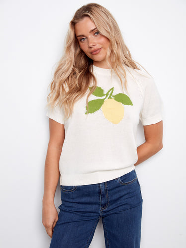 The lemon motif adds playful elegance to this soft 100% cotton sweater, perfect for casual outings. By Charlie B.