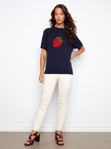 Chic navy sweater showcasing a bold strawberry graphic, made of 100% cotton with raglan sleeves for style. By Charlie B.