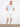Elegant white crochet sweater adorned with a leaf motif and crew neckline by Charlie B.