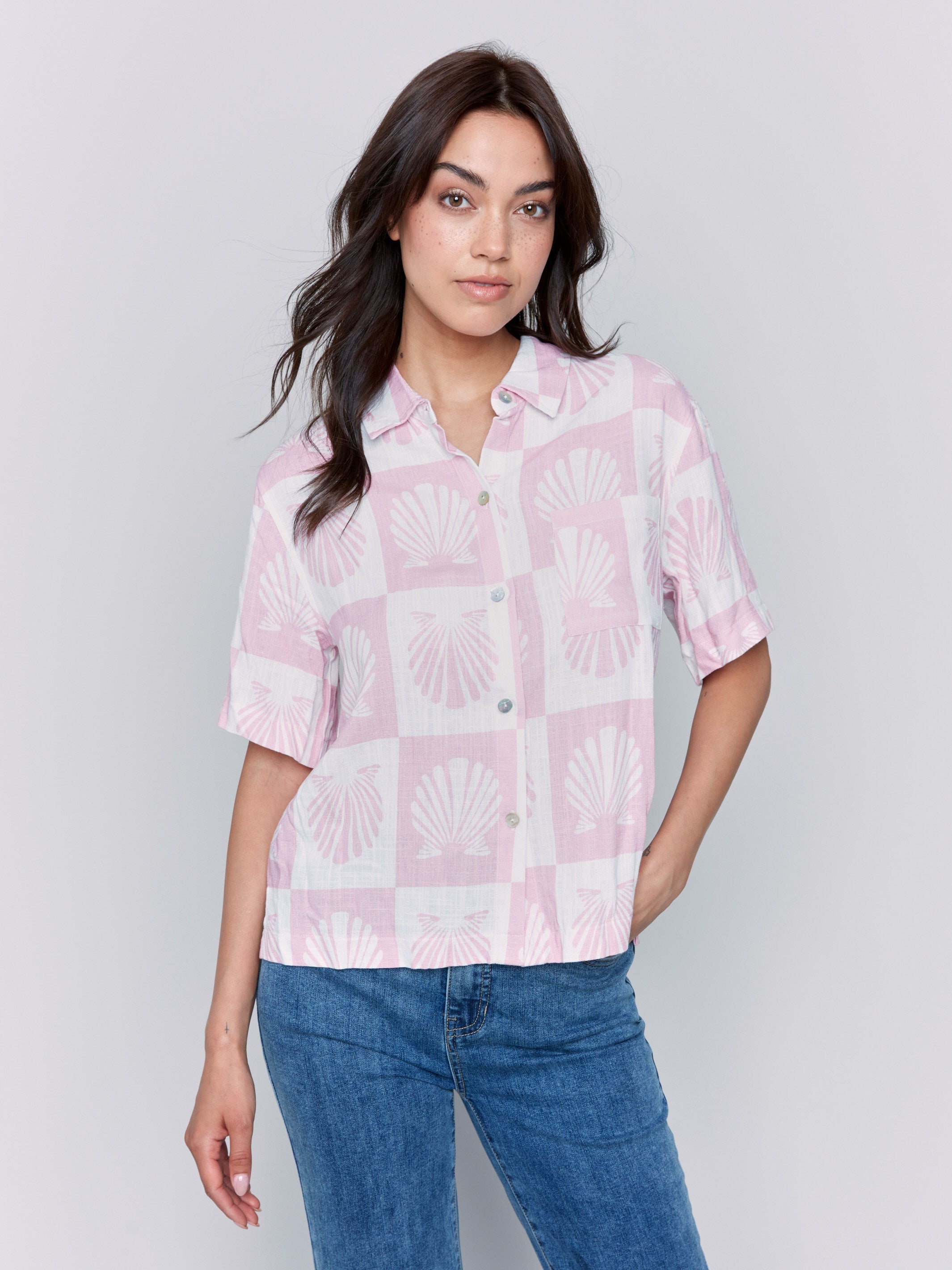 Button-down front pink and white blouse with shell print by Charlie B.