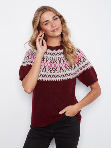 A stylish choice with short raglan sleeves that offer comfort and ease of movement. By Charlie B.